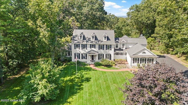 view of front of property with a front lawn