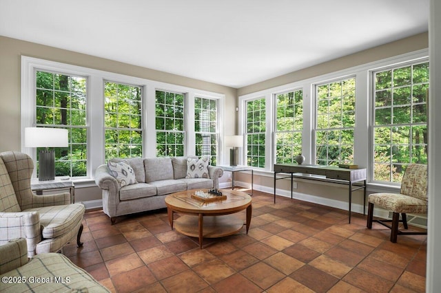 5 Winding Brook Dr, Saratoga Springs, NY 12866 - sunroom featuring baseboards