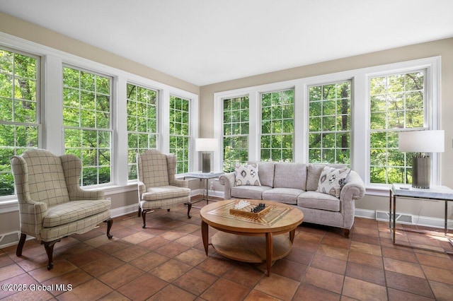 5 Winding Brook Dr, Saratoga Springs, NY 12866 - sunroom / solarium featuring baseboards