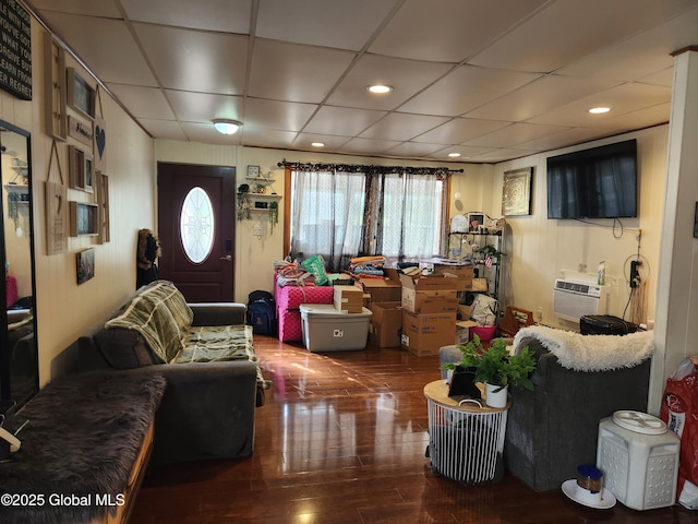 269 Broadway, Menands, NY 12204 - living area with wood finished floors, plenty of natural light, a drop ceiling, recessed lighting, and a wall mounted AC
