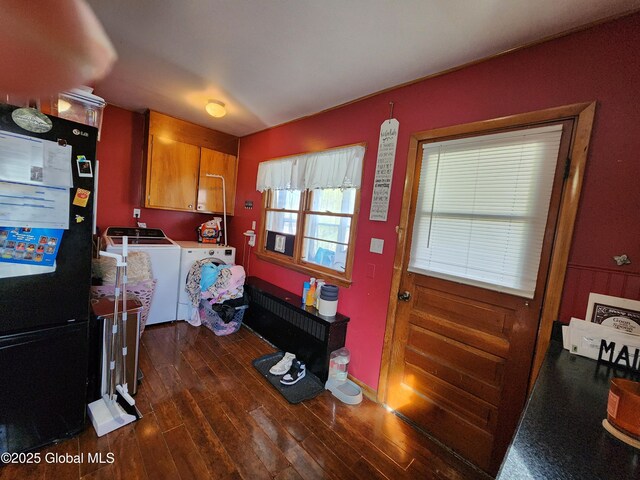 269 Broadway, Menands, NY 12204 - laundry room featuring washer and clothes dryer, dark wood finished floors, and cabinet space
