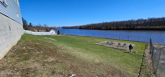 view of yard with a water view