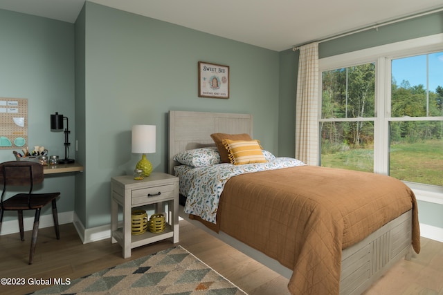 bedroom featuring light wood-type flooring