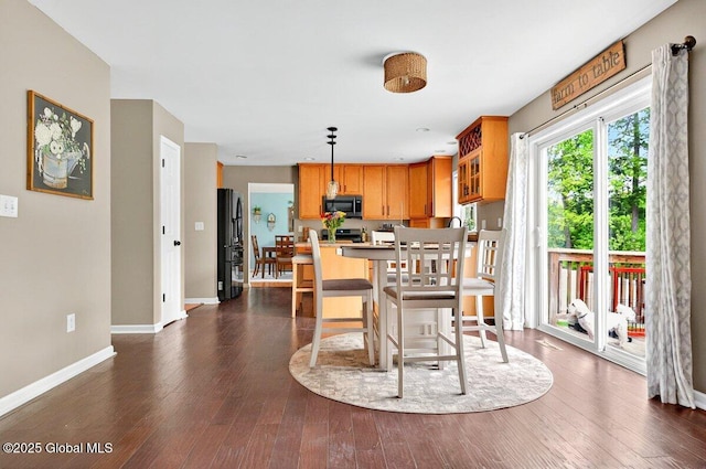 33 Sherman Way, Ballston Spa, NY 12020 - dining room with baseboards and dark wood-type flooring