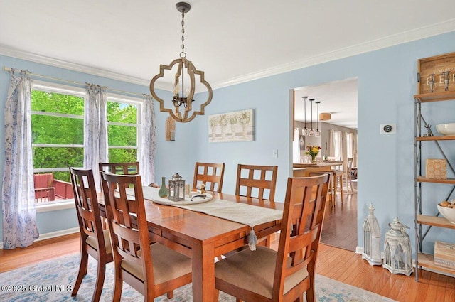 33 Sherman Way, Ballston Spa, NY 12020 - dining room featuring a chandelier, wood finished floors, ornamental molding, and baseboards