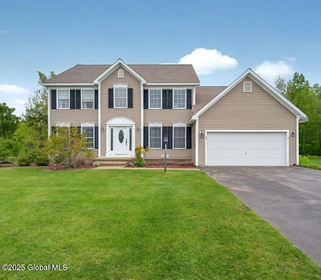 33 Sherman Way, Ballston Spa, NY 12020 - colonial house with asphalt driveway, a front yard, a garage, and roof with shingles