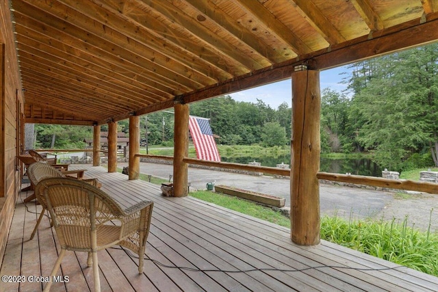 deck featuring a water view