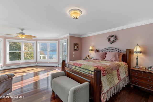 bedroom with dark hardwood / wood-style flooring, ceiling fan, crown molding, and a baseboard heating unit