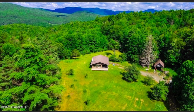 birds eye view of property with a mountain view