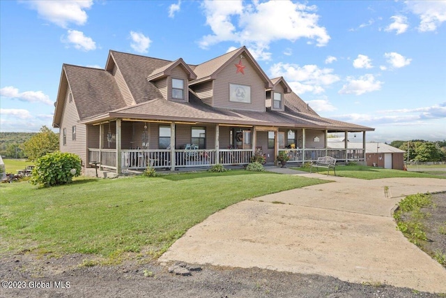 country-style home with a front yard and a porch