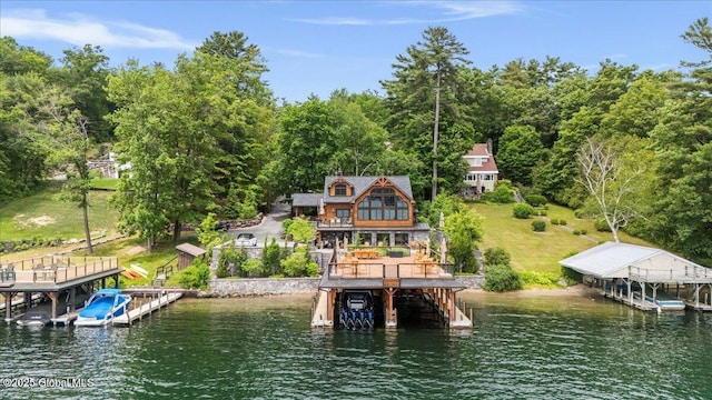 41 Trinity Rock Rd, Lake George, NY 12845 - dock area with stairs, boat lift, a deck with water view, and a view of trees