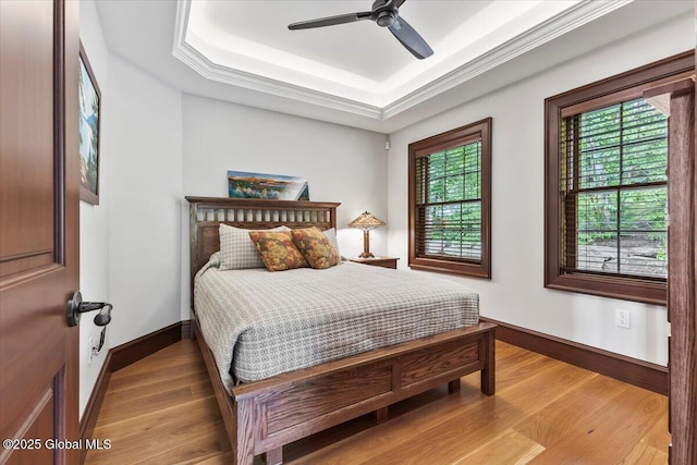 41 Trinity Rock Rd, Lake George, NY 12845 - bedroom with a raised ceiling, wood finished floors, and ceiling fan
