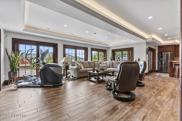 41 Trinity Rock Rd, Lake George, NY 12845 - living room featuring a raised ceiling, light wood-type flooring, and recessed lighting