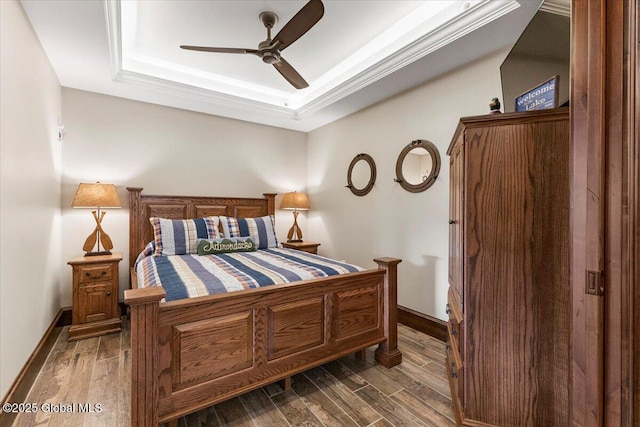 41 Trinity Rock Rd, Lake George, NY 12845 - bedroom featuring a tray ceiling, dark wood-style floors, ornamental molding, and ceiling fan