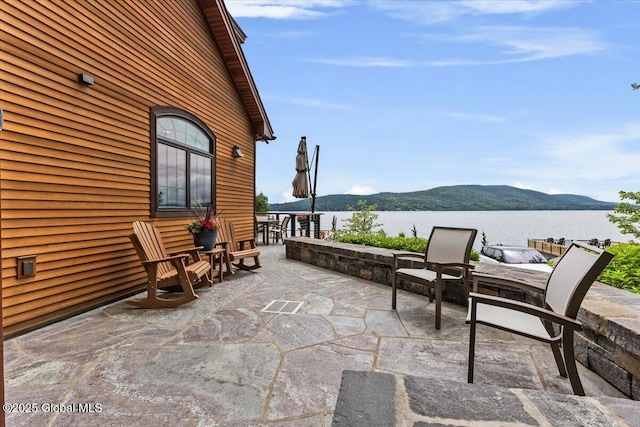 41 Trinity Rock Rd, Lake George, NY 12845 - view of patio featuring a water and mountain view