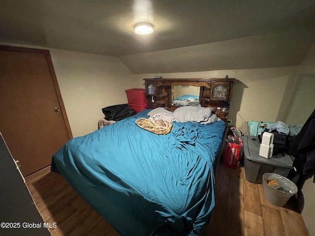 82 N Williams St, Whitehall, NY 12887 - bedroom featuring lofted ceiling and wood finished floors