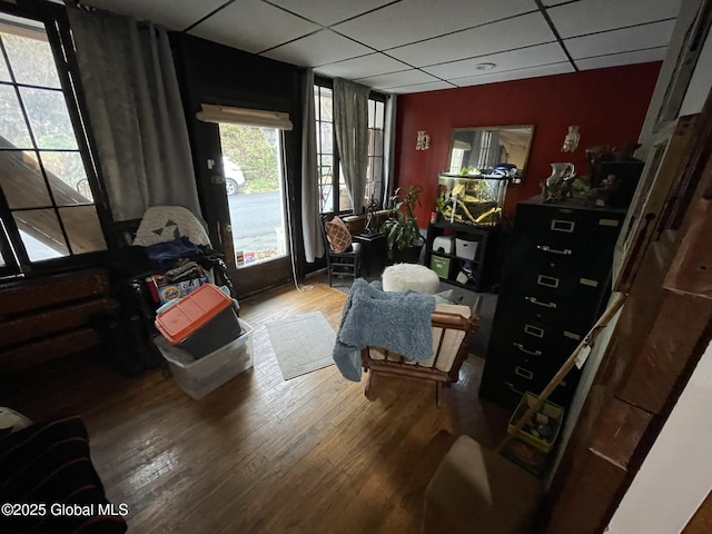 82 N Williams St, Whitehall, NY 12887 - living area featuring wood finished floors and a drop ceiling