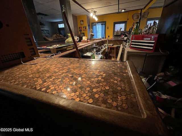 82 N Williams St, Whitehall, NY 12887 - miscellaneous room featuring a workshop area and a paneled ceiling