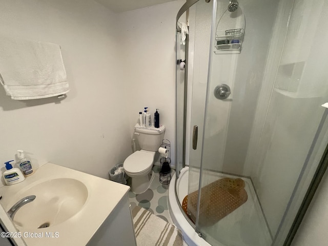 82 N Williams St, Whitehall, NY 12887 - bathroom featuring vanity, a stall shower, and toilet