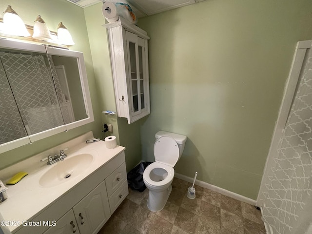 82 N Williams St, Whitehall, NY 12887 - bathroom with toilet, baseboards, and vanity