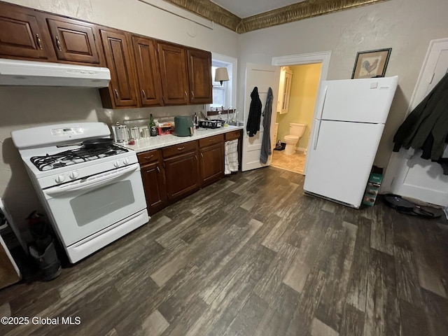 82 N Williams St, Whitehall, NY 12887 - kitchen with white appliances, dark brown cabinets, dark wood-style floors, extractor fan, and light countertops