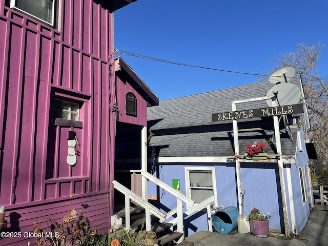 82 N Williams St, Whitehall, NY 12887 - view of side of home featuring a shingled roof