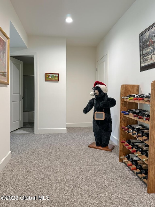 interior space featuring carpet floors, recessed lighting, and baseboards