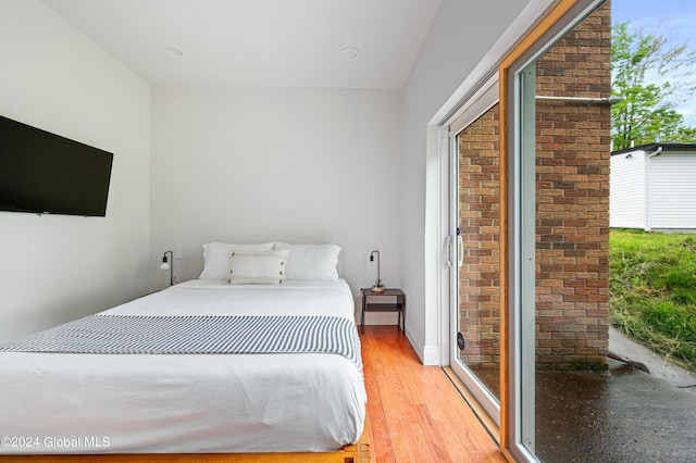 bedroom with light hardwood / wood-style flooring