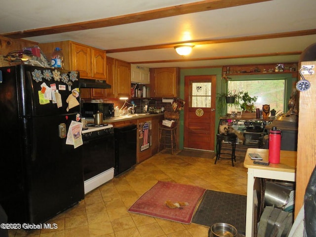 kitchen with black appliances and sink