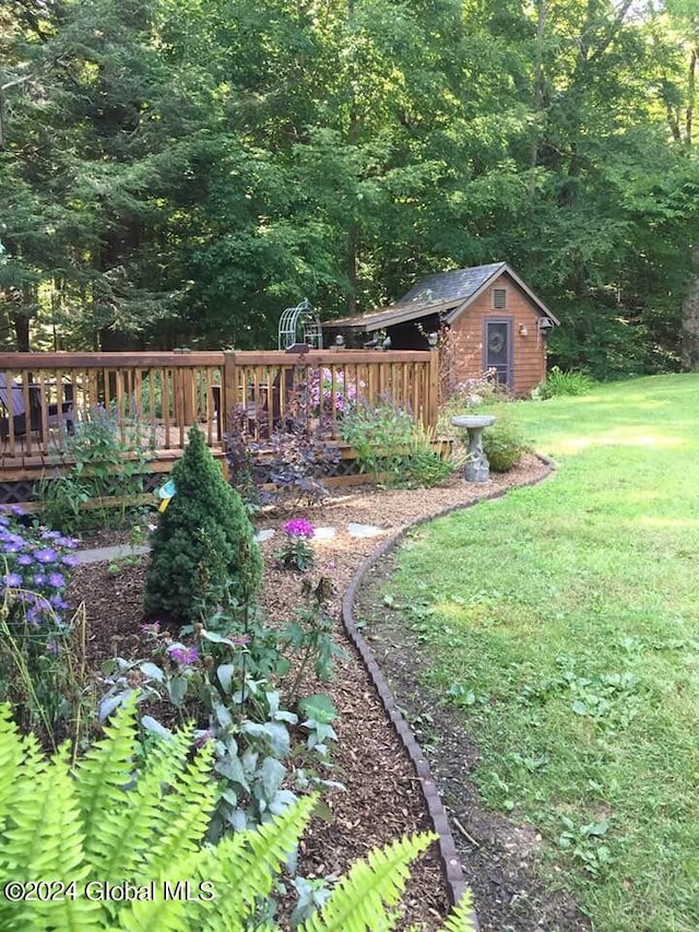 view of yard with a deck