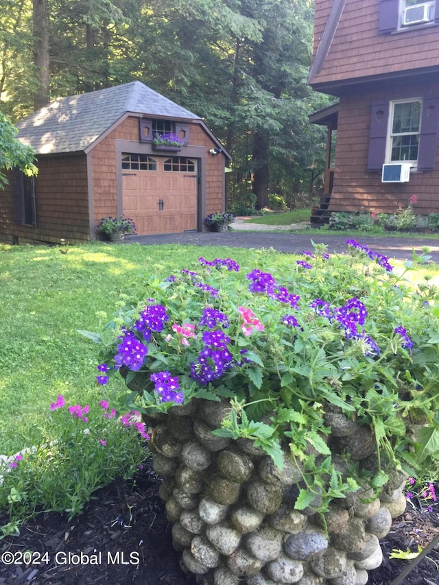 view of yard featuring a garage