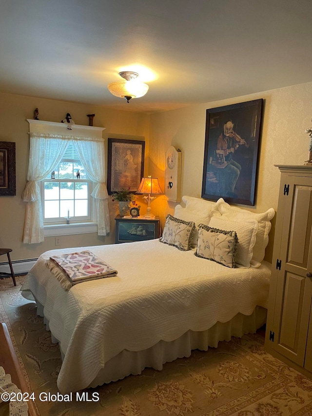 bedroom featuring a baseboard radiator