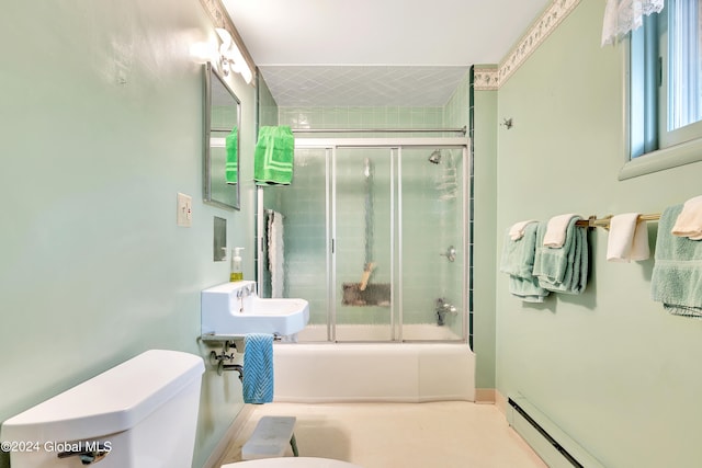 bathroom with a baseboard heating unit, shower / bath combination with glass door, and toilet