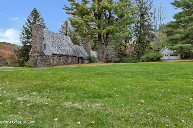 view of yard featuring a garage