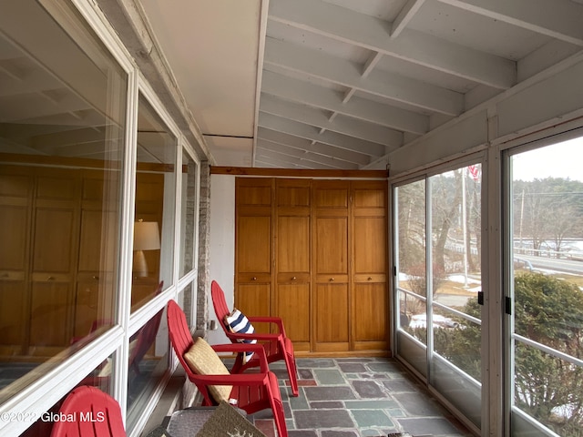 sunroom / solarium with lofted ceiling