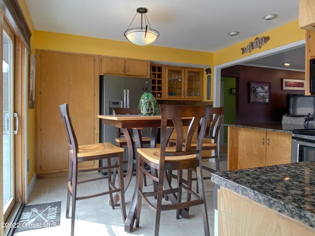 view of tiled dining area