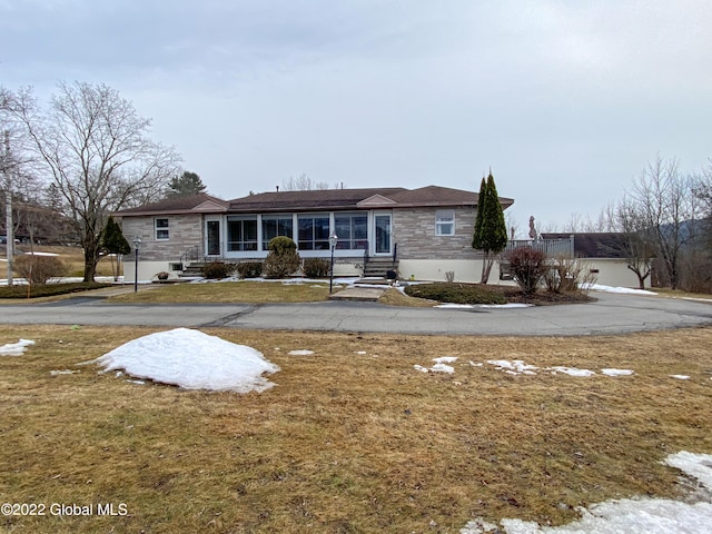 view of front of home with a front yard