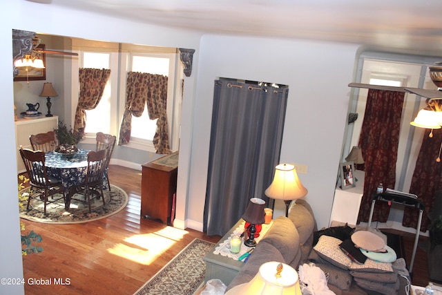 interior space with dark hardwood / wood-style floors and ceiling fan