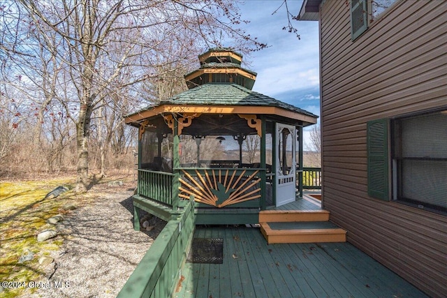 wooden deck featuring a gazebo