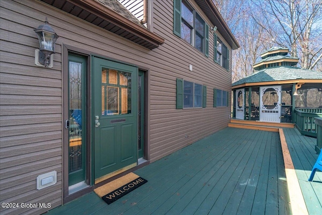 wooden deck featuring a gazebo