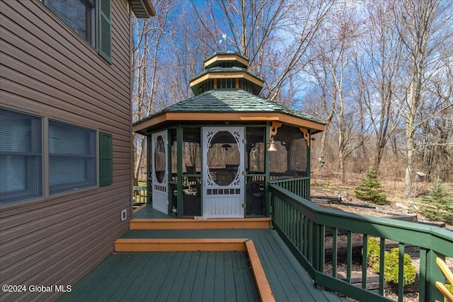 wooden terrace with a sunroom