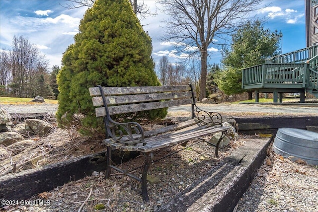 view of home's community featuring a wooden deck