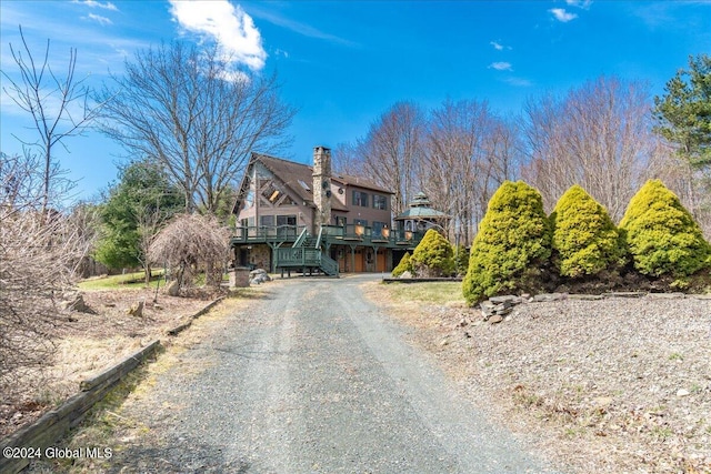 view of front of property with a deck