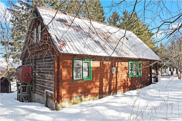 view of snow covered property