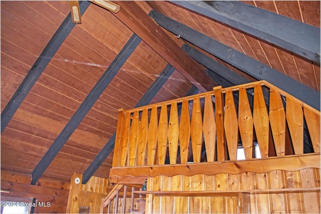 details featuring beamed ceiling and wooden ceiling