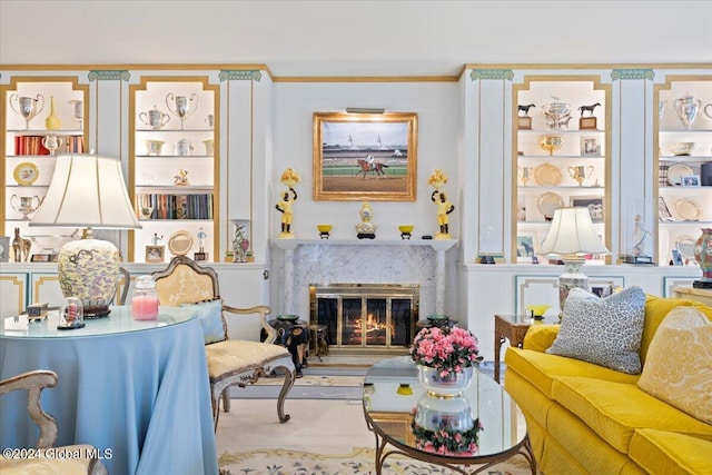 interior space with ornamental molding and a fireplace