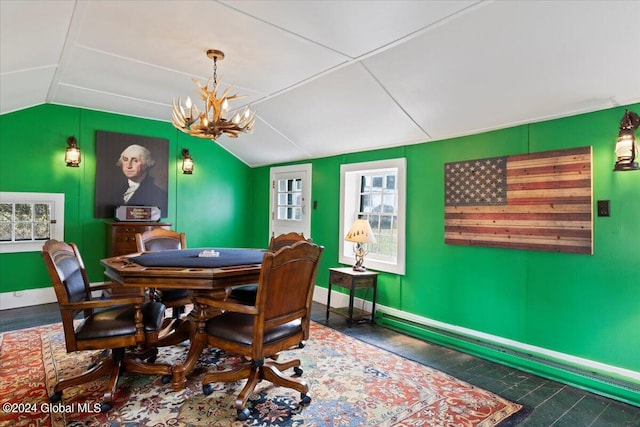 dining room with an inviting chandelier and vaulted ceiling