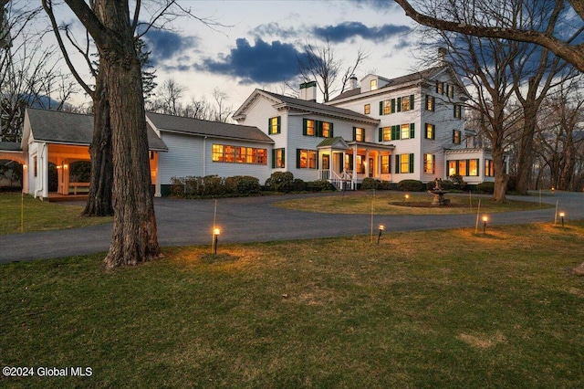 view of front of house with a lawn