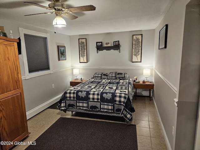 bedroom with light tile flooring and ceiling fan