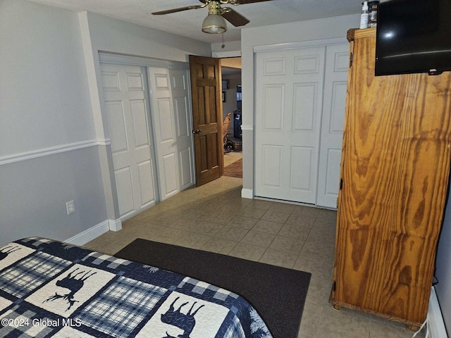 bedroom featuring light tile floors and ceiling fan